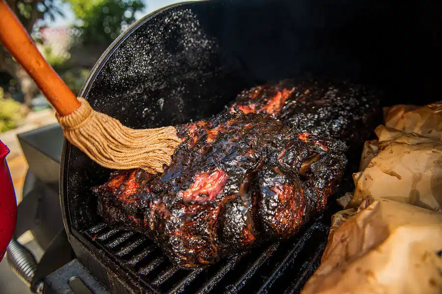 Boo and Henrys BBQ Mopping Sauce on pork shoulder